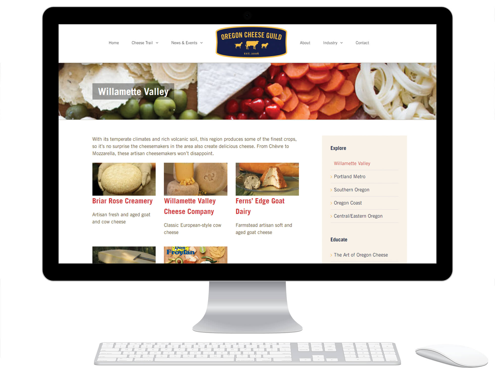 Desktop computer displaying the cheese trail section of the Oregon Cheese Guild website