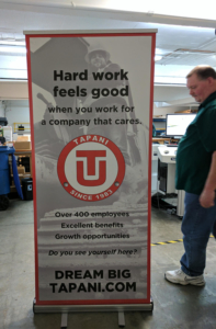 Stand-up banner, roughly 7 feet tall