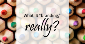 Close up of the tips of colored pencils. The text reads, "What IS branding, really?"